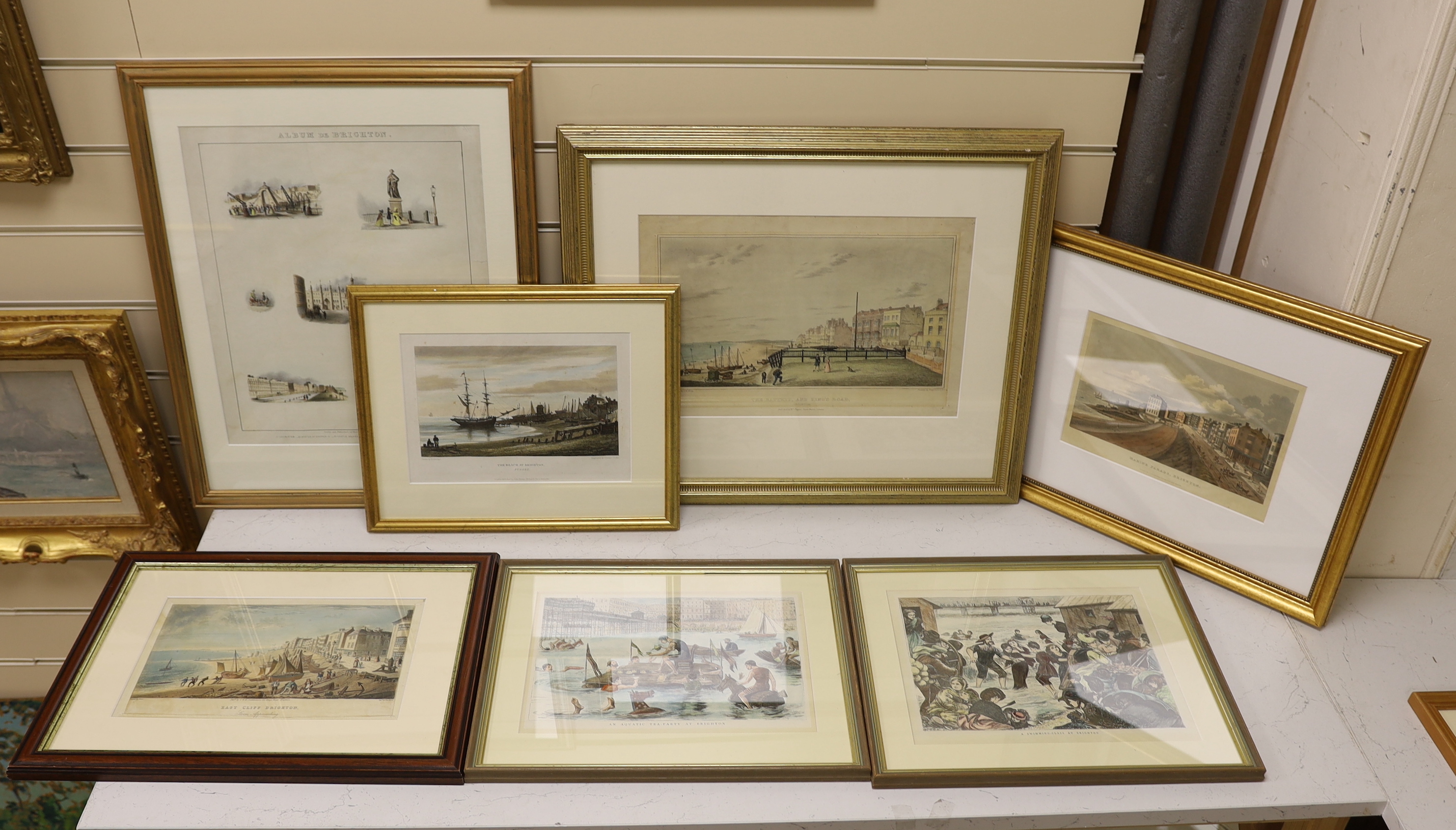 Seven 19th century engravings and prints of Brighton views, some hand coloured, including after M Jones, East Cliff, storm approaching, publ. C & R Sicklemore, one after C W Wing, The Battery and Kings Road, Publ. Willia